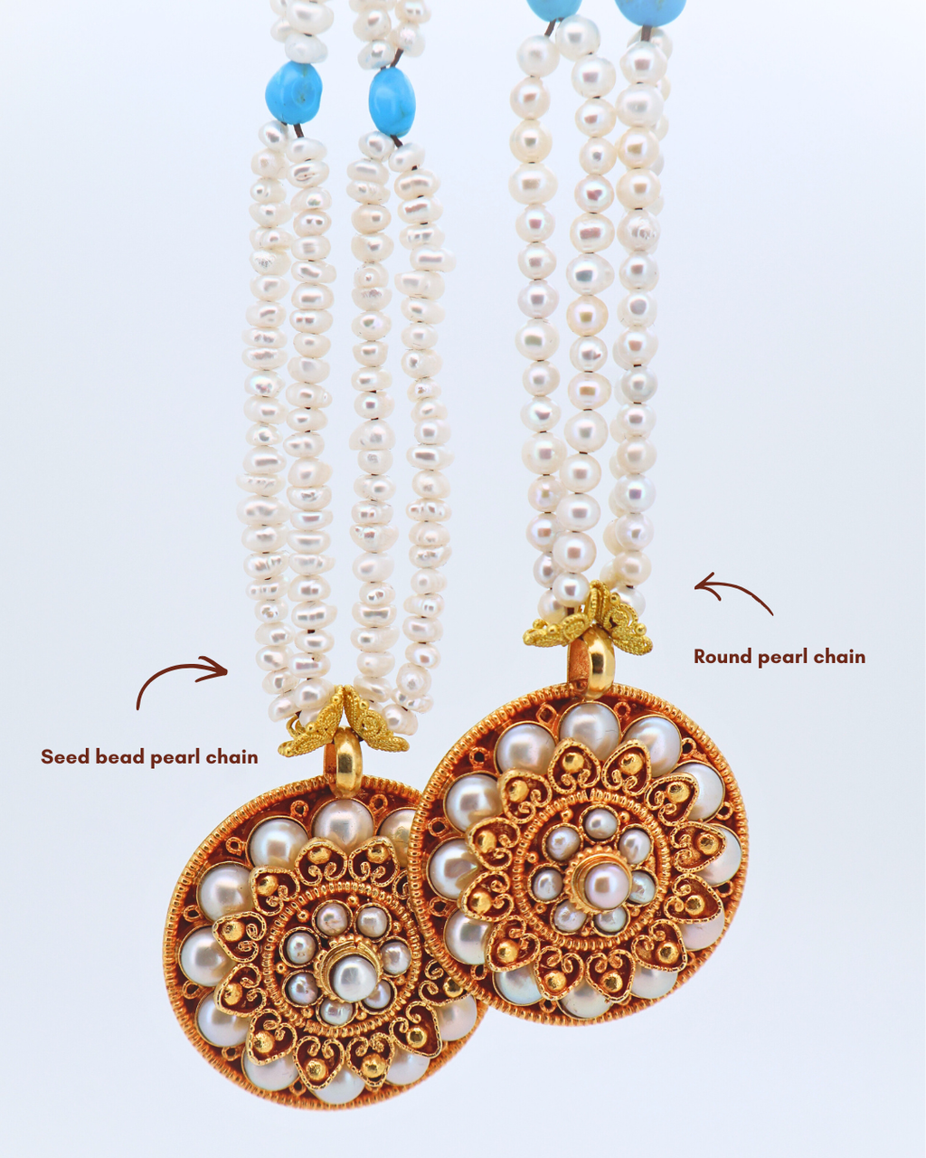 Pair of gold and pearl earrings with round pearl chain on a white background